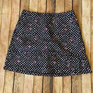 Lady Hagen Golf Skort size 4 NWOT accented partial pleats in hem, 2 slash pocket